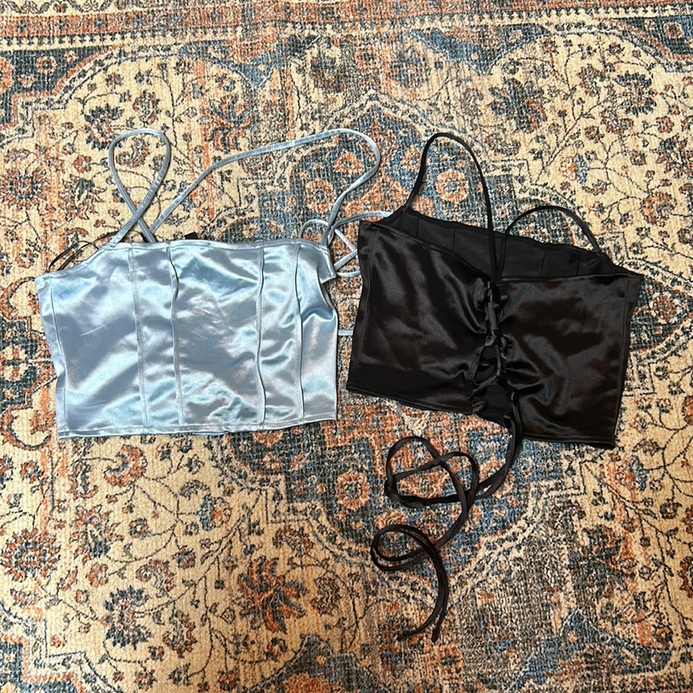 Wore this crop tops like once! They are satin one is baby blue the other black!